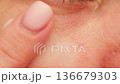Woman apply cream for hands skin, Close-up of hands with exfoliating cream, demonstrating effective 136679303