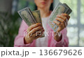 Woman counting US Dollar bills, close-up. Concept of investment and success 136679626