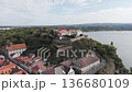 Travel concept. Aerial view of european city with architecture buildings and streets. Petrovaradin Novi Sad fortress along the Danube river 136680109