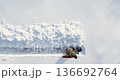 Watch a man carefully navigate and carve through deep snow, steadily breaking trail with unwavering focus and resilience as he moves forward in a snowy wilderness. 30 FPS 4k footage. 136692764