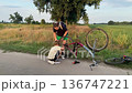 Happy family cycling at a countryside 136747221