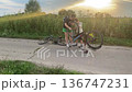 Happy family cycling at a countryside 136747231