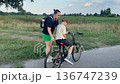 Happy family cycling at a countryside 136747239
