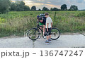 Happy family cycling at a countryside 136747247