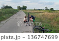 Happy family cycling at a countryside 136747699