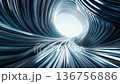 A swirling tunnel of metallic blue and silver tones leading to a bright light at the end. The design suggests motion and depth, evoking a sense of futuristic technology. 136756886
