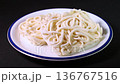 Rotating frozen udon noodles on a plate 136767516