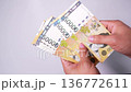 Video of counting Korean banknotes by hand 136772611