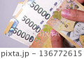Video of counting Korean banknotes by hand 136772615