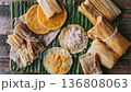 Traditional Mexican Tamales and Sopes Ready to Enjoy on Banana Leaf. 136808063