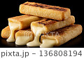 Crispy Fried Cheese Sticks with Gooey Melted Cheese Filling 136808194