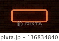 Flickering neon sign on a brick wall 136834840