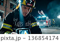 Focused Male Firefighter Acting. Ai generated 136854174
