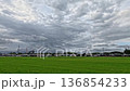 Cloud timelapse, view of rice fields near residential area 136854233