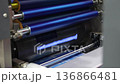 High resolution Industry printer close up. Industrial inkjet printer in operation. printing pattern on large sheet of fabric or paper. Automate printer for modern printing and digital print technology 136866481