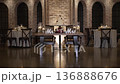 Atmospheric wedding venue setup with elegant table settings, glowing candles, and decorative lanterns creating a warm and romantic ambiance. Beautiful reception d cor prepared for guests, cozy evening 136888676