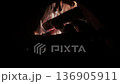 In the darkness, I can hear the crackling of the fireplace and the maple leaves burning 136905911