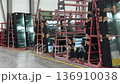 Prepared double-glazed windows for plastic window stand on special racks at a glass processing and manufacture of PVC windows plant. 136910038