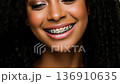Radiant smile of a beautiful afro american woman with braces captured in lifelike 3d animation showcasing the warmth and joy of self-expression. Generative AI 136910635
