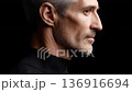 Close-up of a mature man's profile, expressing the charm of time 136916694