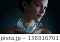 Elegant woman wearing a futuristic glowing necklace 136916701