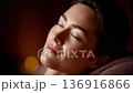 Close-up of a relaxed woman's face 136916866