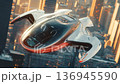 Futuristic vehicle soars above a vibrant city skyline during sunset with bright lights illuminating the surroundings 136945590