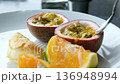 Passion fruit mandarin dessert on a white plate at an all-inclusive breakfast restaurant. 136948994