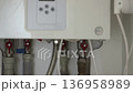 Water pipeline of the heating gas boiler. Closeup, selective focus. 4K 136958989
