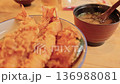 Deepfried battered shrimp accompanied by miso and fresh vegetables 136988081