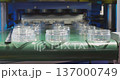 Plastic jars falling off conveyor belt in production line 137000749