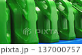 Green plastic motor oil canisters on a shelf 137000757