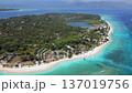 Aerial view of Gili Meno island, Indonesia, with Gili Air and Lombok visible in the background. Scenic tropical seascape with turquoise water and coral reefs. 137019756