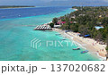 Aerial view of Gili Trawangan, Indonesia, with tropical coastline, turquoise water, and tropical resorts. Scenic travel destination near Lombok. 137020682