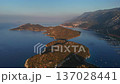 Aerial view of scenic Mediterranean islands and coastline with bays, mountains and marinas at sunset. Kas, Turkey 137028441