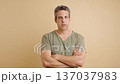 Mature caucasian man with crossed arms looking confident 137037983