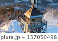 Visitors can see the Tanvaldsky Spicak Lookout Tower surrounded by snow in winter. The morning brings a unique view of the area. This location offers a great experience for tourists. 137050498