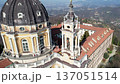 Aerial drone view of the majestic Basilica of Superga and its monastery buildings on the hilltop in Turin, Italy, historic baroque architecture, city panorama, sunny daylight. 137051514