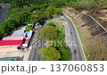 Modern Colombian road surrounded by nature, Asphalt highway through rural landscape, Infrastructure development in Colombian countryside 137060853