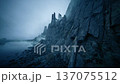 Desolate seaside cliff with ancient ruins and mist, Somber coast with crumbling fortress structures and veil of mist creating cinematic atmosphere 137075512
