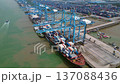 Port Klang with container ships loading cargo. Amazing aerial view drone 137088436