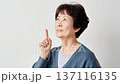 An elderly woman remembering something 137116135