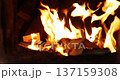 The instant the paper money burned fiercely inside the incense burner 137159308