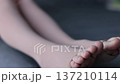 Female legs wearing compression stockings. 4K 137210114