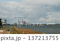 Maritime Scene Scene. Ship Nears Harbor With Clouds. Clouded Harbor With Approaching Cargo Vessel 137213755