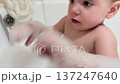 Toddler Enjoying Bubble Bath 137247640