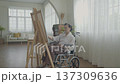 Artist concept of 4k Resolution. Asian woman drawing in the living room. Artist is creating work. People with disabilities are creating hobbies. 137309636