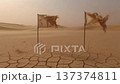 Two Tattered Flags Blowing Sandstorm Cracked Desert Earth Wide Shot 137374811