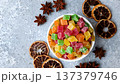 Candied fruit in colorful cubes as an ingredient for baked goods and sweets. Candied fruit 137379746