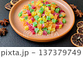 Candied fruit in colorful cubes as an ingredient for baked goods and sweets. Candied fruit 137379749